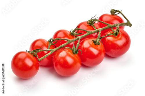 Fresh cherry tomatoes, isolated on a white background. High resolution image.
