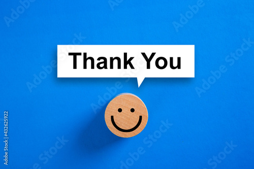 Smiling face  with words Thank you.