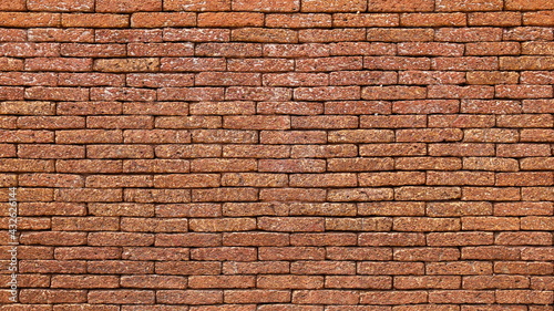 A reddish brown laterite brick wall. Attractive antique red brick wall texture for background designs with copy space. Selective focus photo