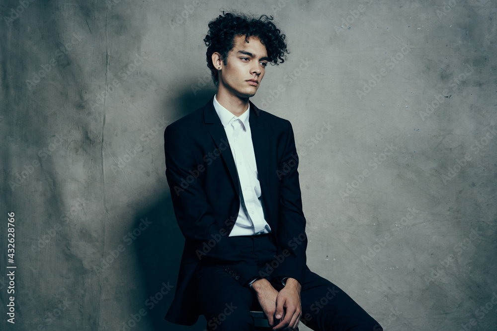 man in black suit modern style studio official man in black suit modern style studio official