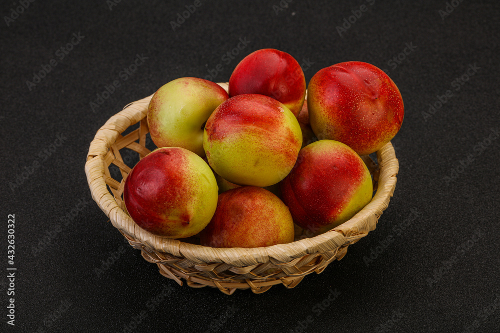 Sweet small nectarines in the basket Sweet small nectarines in the basket