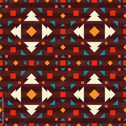 Geometric ornament of rhombuses and triangles in the native American style. Seamless pattern for web, print, textile, wallpaper, card, wrapping paper and background