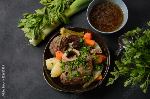 Fototapeta Naklejka Na Ścianę i Meble -  Pot-au-feu, traditional french stew. Stewed beef and potatoes. In France considered a national dish.