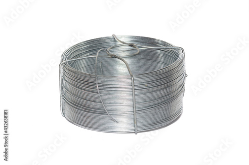 Coil of Tie Wire, galvanized metal joiner, hardware. Isolated on a white background. Spool of wire.