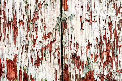 Wooden texture with scratches and cracks. It can be used as a background