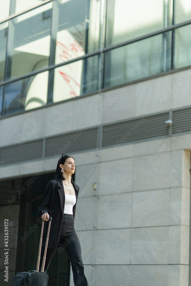 Businesswoman is walking towards the company Businesswoman is walking towards the company