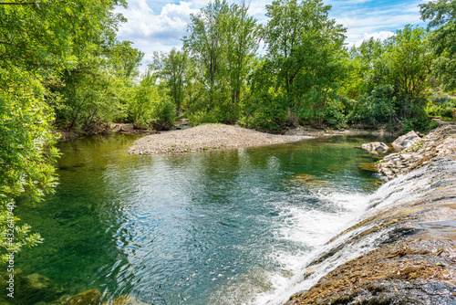 Beautiful river Cesse near the picturesque town of Bize Minervois in the South of France  photo
