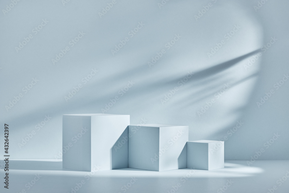 Blue background for product presentation with shadows and light. Empty podiums. Mockup. Blue background for product presentation with shadows and light. Empty podiums. Mockup.