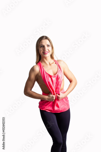 Athletic  sexy young woman on a white background