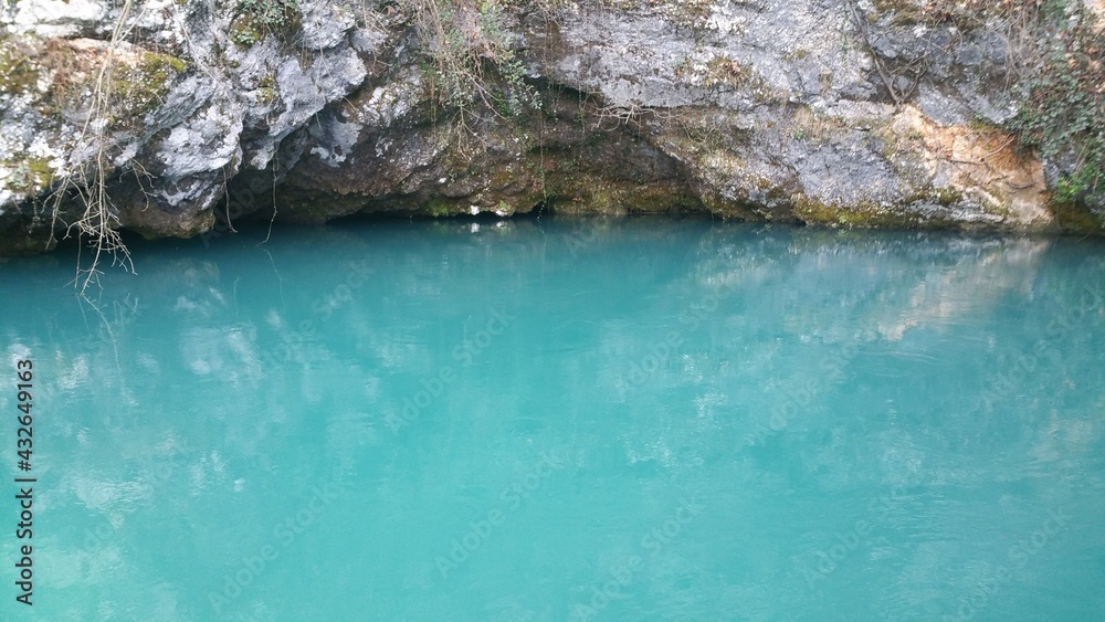 The source of Gorgazzo, in Polcenigo, is a underwater cave where the homonymous torrent originates, the tributary of the River Livenza. Shot in a winter cloudy and rainy day. The source of Gorgazzo, in Polcenigo, is a underwater cave where the homonymous torrent originates, the tributary of the River Livenza. Shot in a winter cloudy and rainy day.