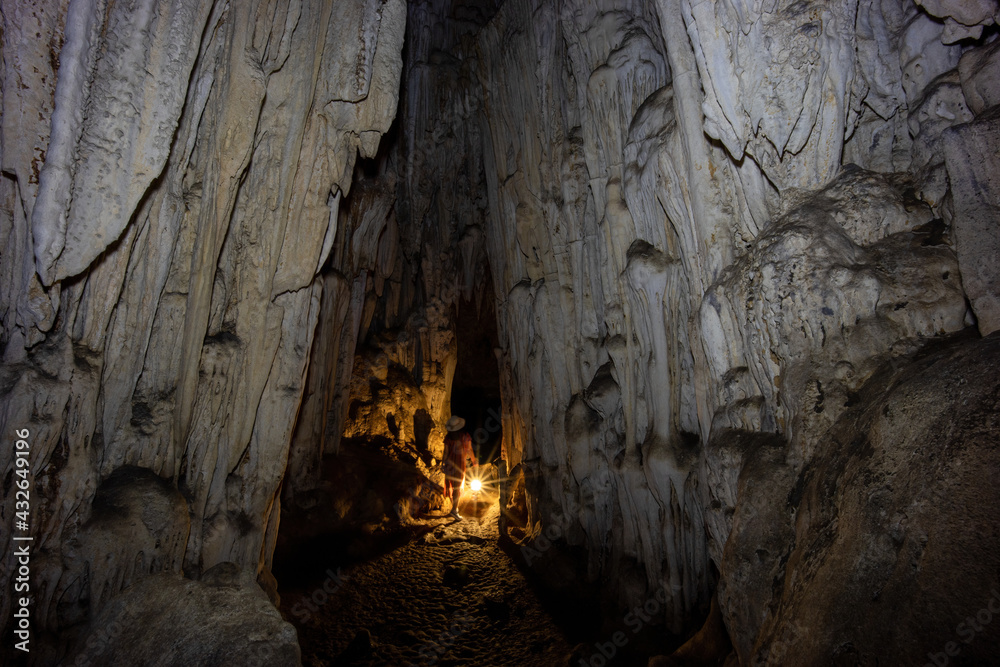 Beautiful nature of a cave, Magnificent entrance into the cave, Woman In Cave Beautiful nature of a cave, Magnificent entrance into the cave, Woman In Cave