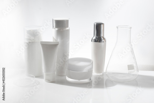 mockup of beauty fashion cosmetic makeup bottle lotion product with skincare healthcare concept on background