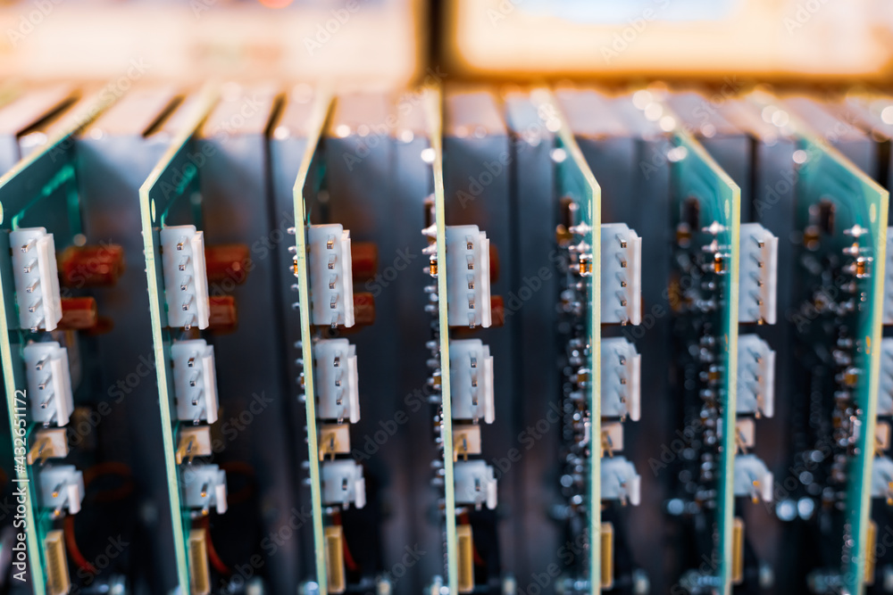 Close-up electric green embedded microcircuits in production