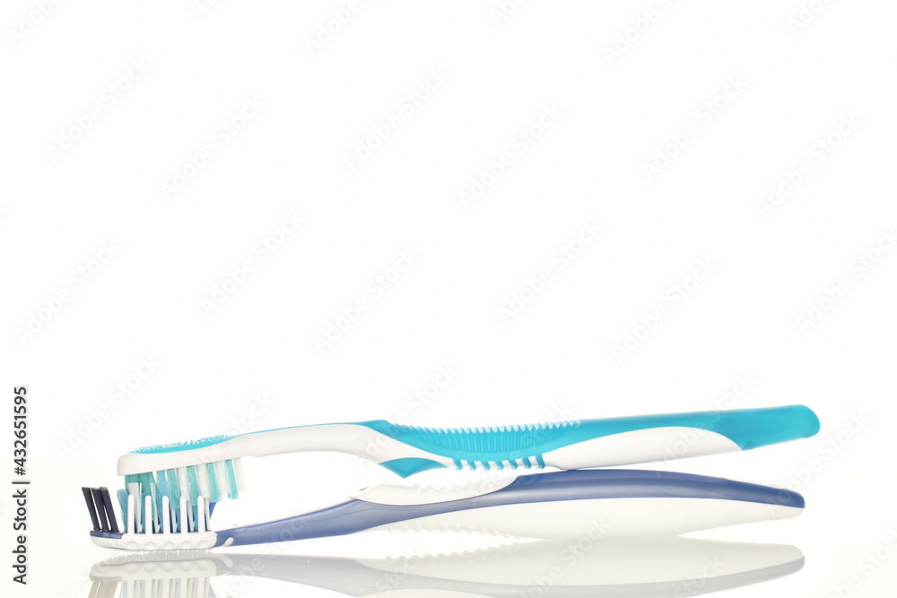 Two toothbrushes, close-up, isolated on white. Two toothbrushes, close-up, isolated on white.