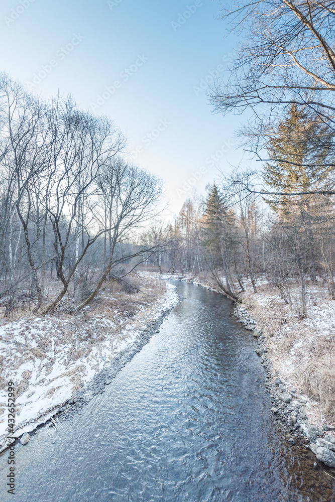 Snow and trees and rivers under the setting sun in Changbai Mountain, Jilin, China in winter Snow and trees and rivers under the setting sun in Changbai Mountain, Jilin, China in winter