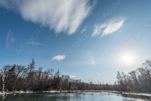 Snow and trees and rivers under the setting sun in Changbai Mountain  Jilin  China in winter 