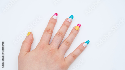 girls hand with Two-tone manicure on white background