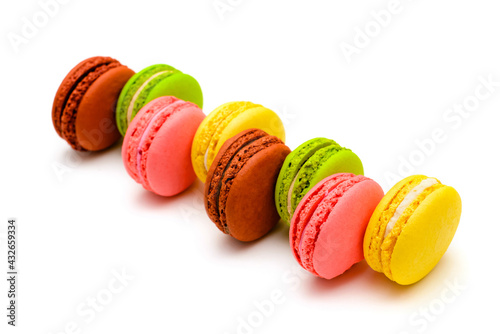 multicolored color macaron cakes on a white background