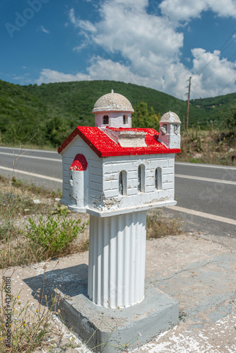 Kandylakia - typical greek miniature roadside shrine photo