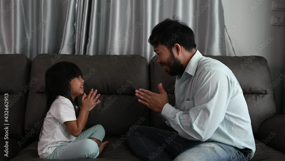 Father day concept,Asian dad and daughter use time together at home Father day concept,Asian dad and daughter use time together at home