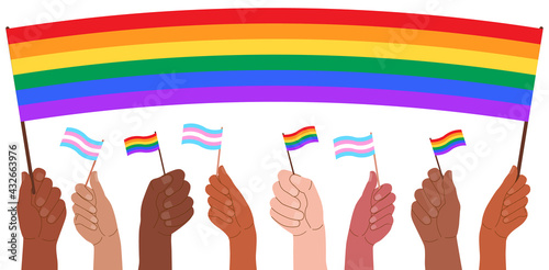 People hold a poster and flags in the form of a rainbow, LGBT symbols, support for transgender and lesbian people.