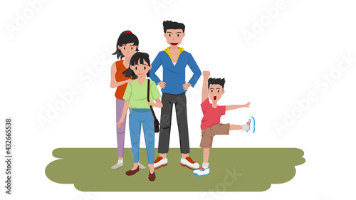 Happy family time smiling and standing on the green grass. Parents and sons and daughters. son stood up and raised his hand in joy. Daughter carrying a crossbody bag.