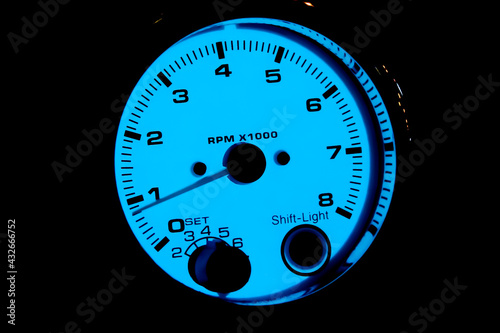 Sport tuning tachometer blue glowing display showing engine idle speed