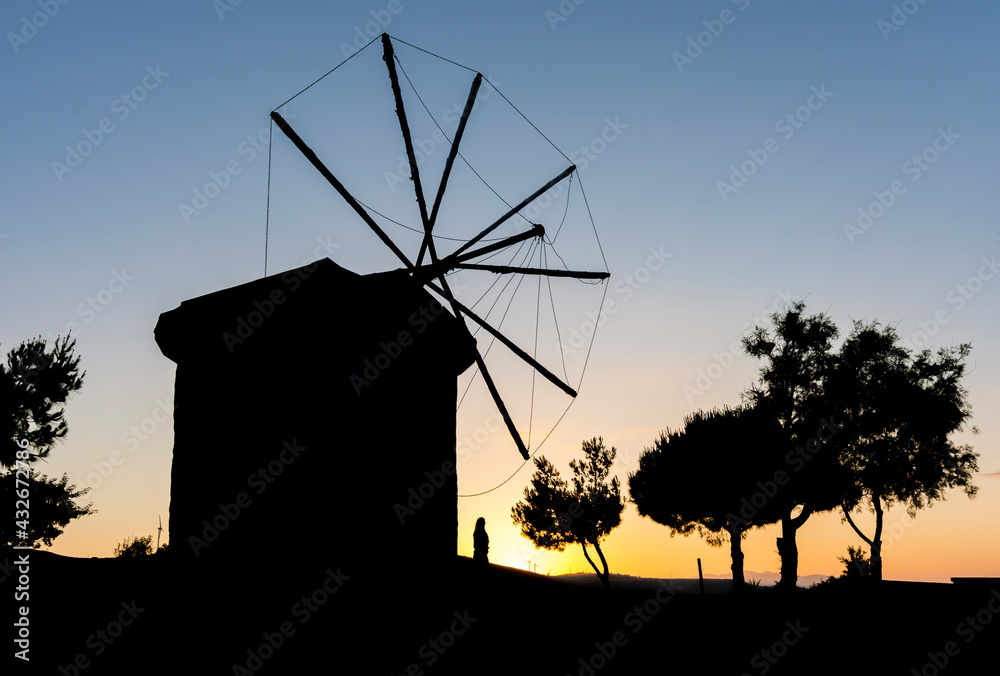 Windmill silhouette in Alacati, Cesme