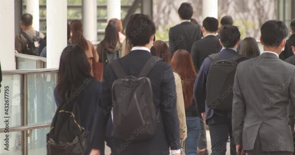 A slow motion of walking office workers at urban city in Shinagawa A slow motion of walking office workers at urban city in Shinagawa