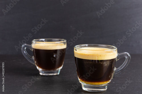 glass cups with freshly brewed espresso