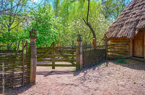 The wooden wicket of the old Blacksmith's Estate, Mamajeva Sloboda Cossack Village scansen, Kyiv, Ukraine photo