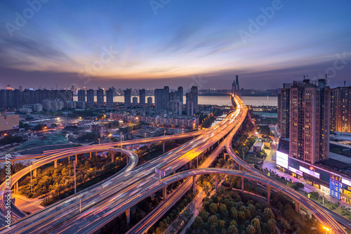 wuhan Erqi yangtze river bridge at hubei province, China.Aerial view highway road intersection for transportation, distribution or traffic background.