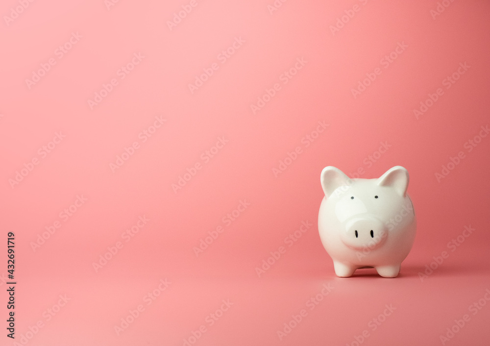 Piggy bank in pink background minimal style, Business, finance, investment, saving and corruption concept.