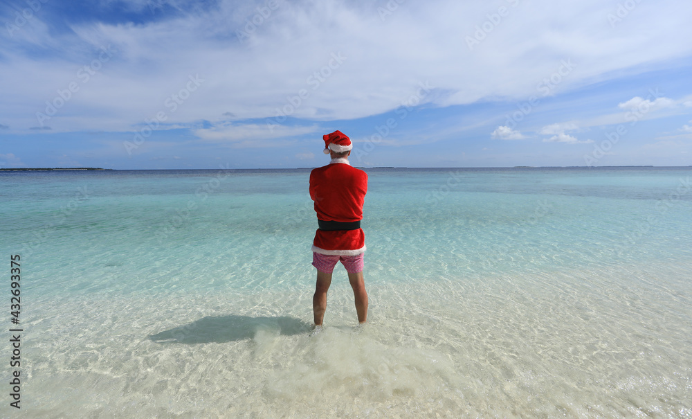 portrait of Santa Claus on a tropical island