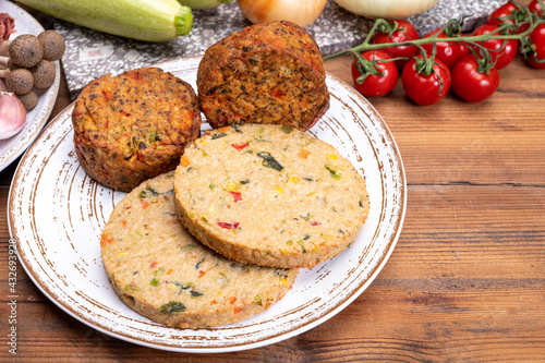 Round vegetarian patties or burgers made from grains, vegetables and legumes