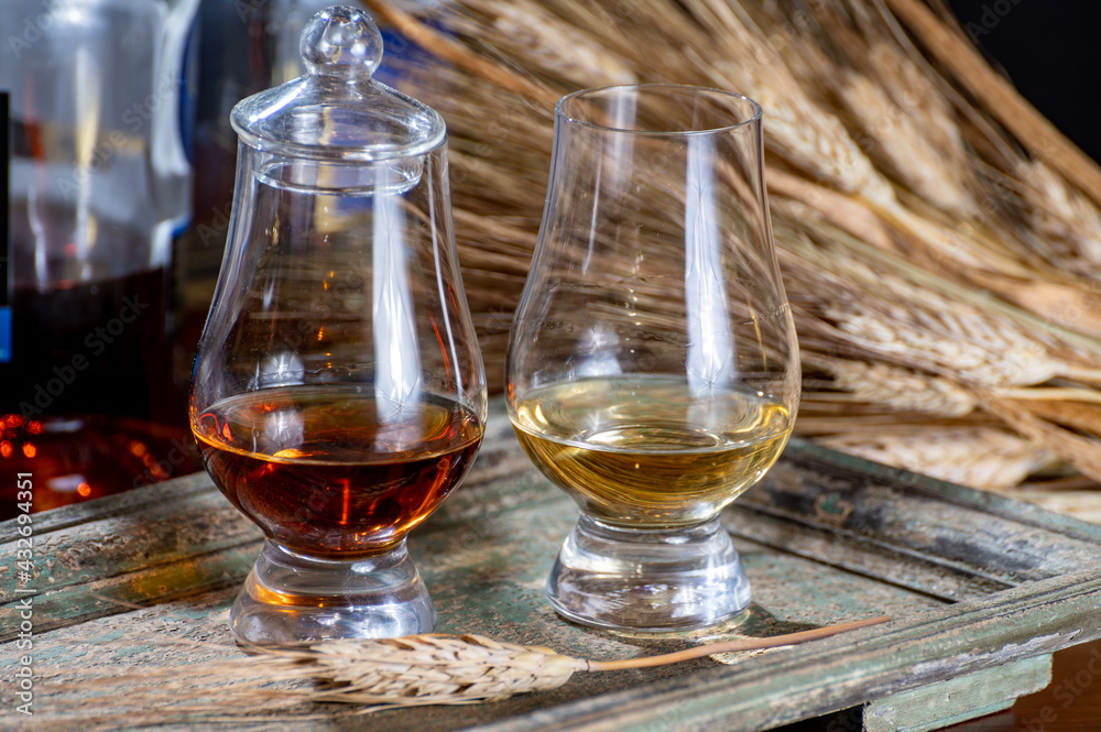 Glasses of scotch whisky served in bar in Edinburgh, Scotland, UK Glasses of scotch whisky served in bar in Edinburgh, Scotland, UK