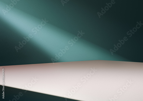 White podium for displaying product and turquoise wall in background lit by diagonal light stripe.
