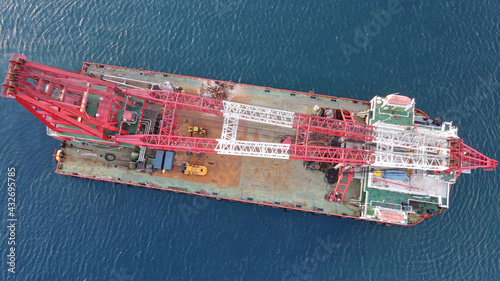 Top view of a massive crane barge used for heavy lifts in Oil and Gas or Construction industries.