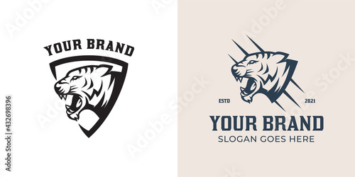 vintage retro logo of shield with tiger head, jaguar, panther black version logo collection for your brand