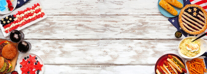 Fourth of July, patriotic, American themed food. Above view double side border on a white wood banner background. Copy space.