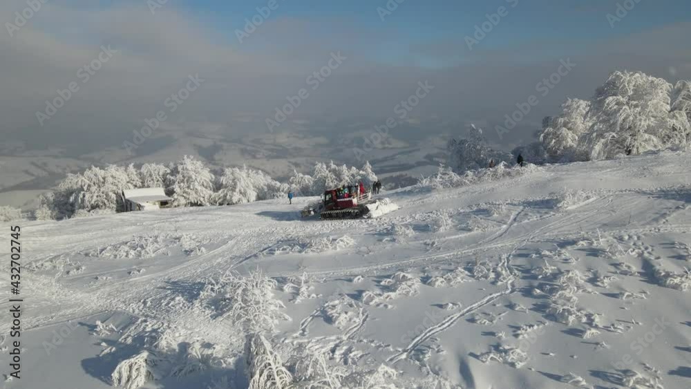 Aerial view of the mountain road in snowy winter Aerial view of the mountain road in snowy winter