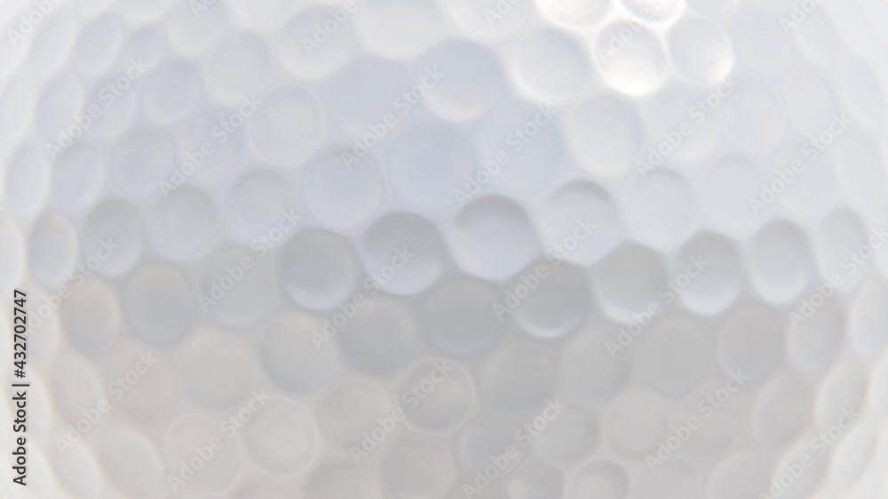 360-degree seamless looping spin of the white golf ball surface as background realistic 3D animation rendered in UHD