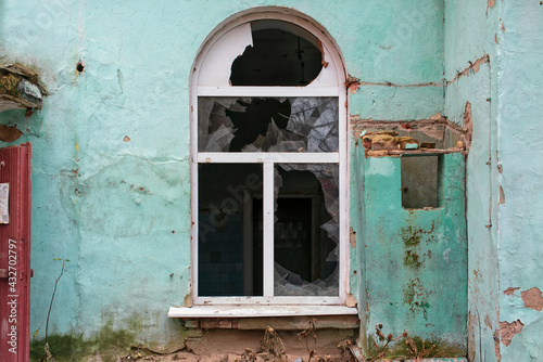 Broken window in an old building © Denis Gavrilov Photo