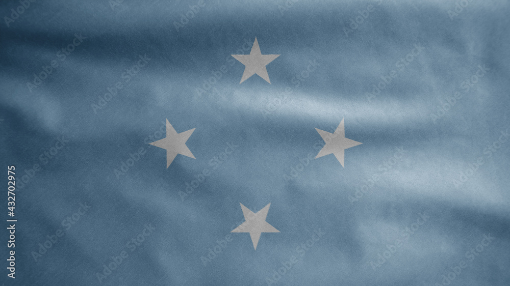 Fototapeta premium Micronesian flag waving in the wind. Micronesia banner blowing soft silk.