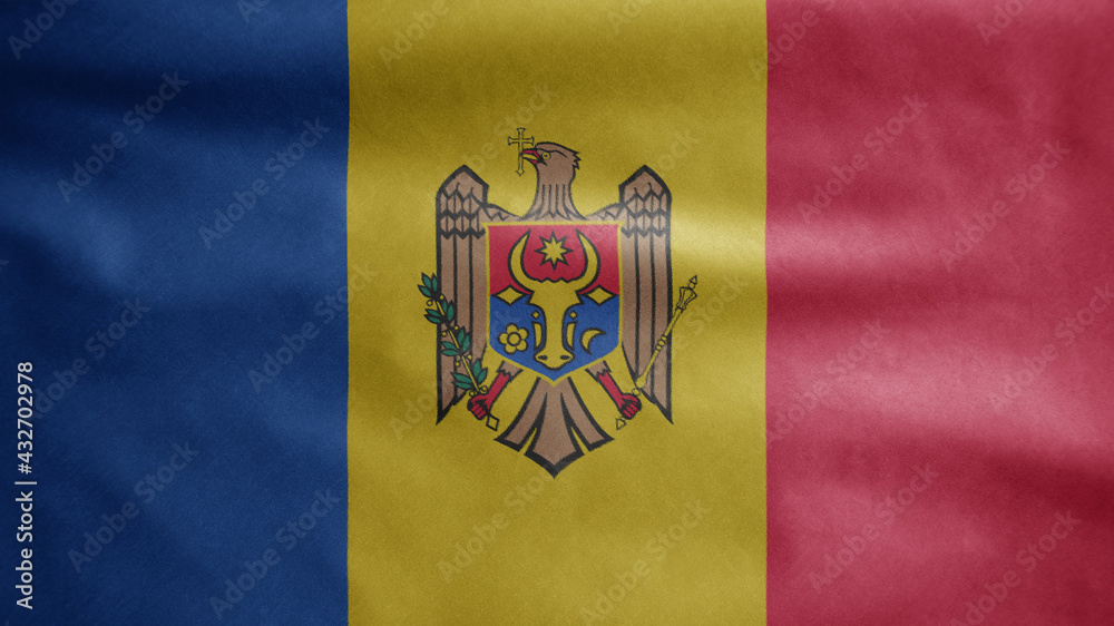 Moldovan flag waving in the wind. Moldavia banner blowing soft silk.