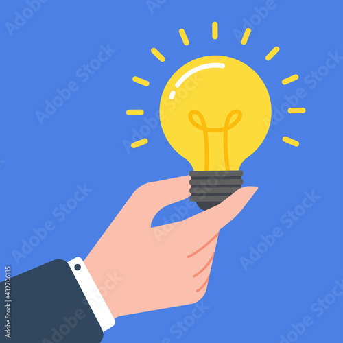 Hand of a businessman holding a glowing light bulb. Creative concept of business idea, solution, innovation, or inspiration. Simple trendy cute cartoon vector illustration. Flat style graphic.