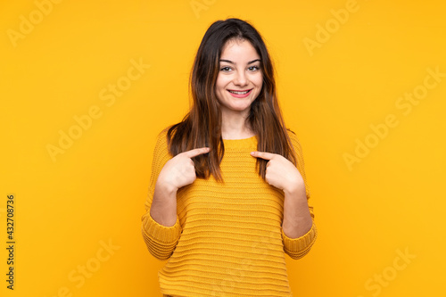 Young caucasian woman isolated on yellow background with surprise facial expression