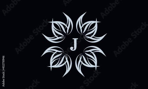 Vintage exquisite floral monogram with the letter J as a sign of business, boutique, shop, cafe, hotel, etc. Gray sign on a dark background
