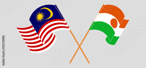 Canvas Print Crossed and waving flags of Malaysia and Niger