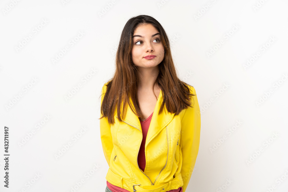 Young caucasian woman isolated on white background and looking up Young caucasian woman isolated on white background and looking up